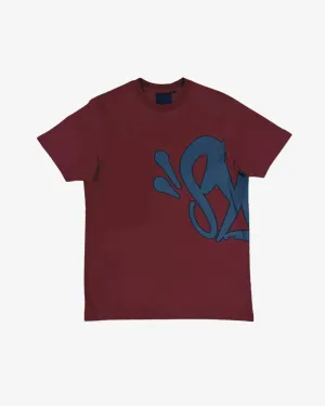 SYNA WORLD LOGO BURGUNDY TEE (NEW)